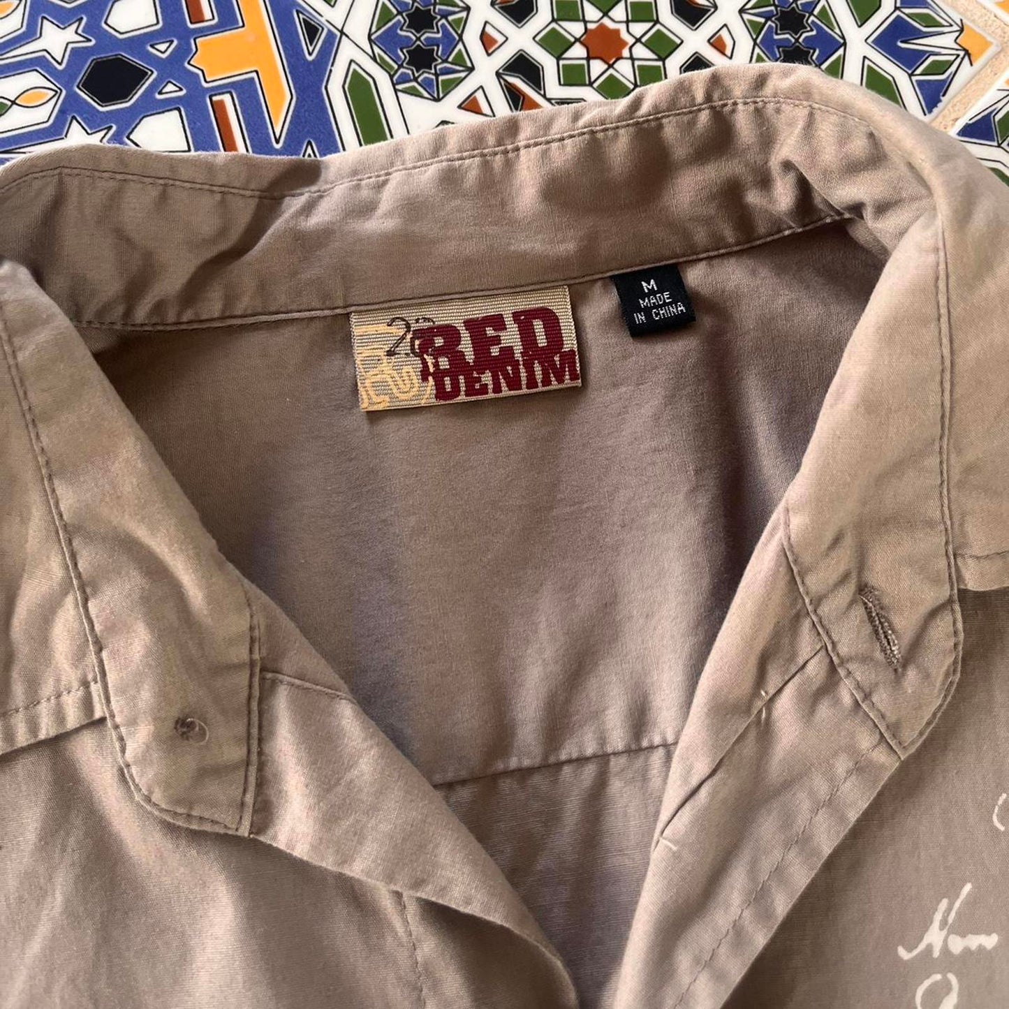 26 red button up shirt