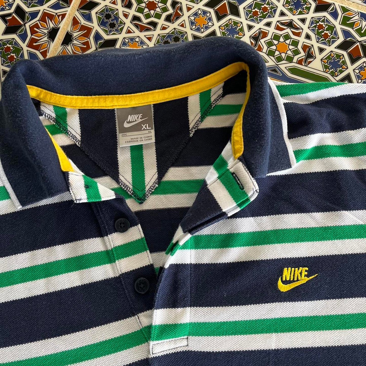 horizontal stripped Nike polo