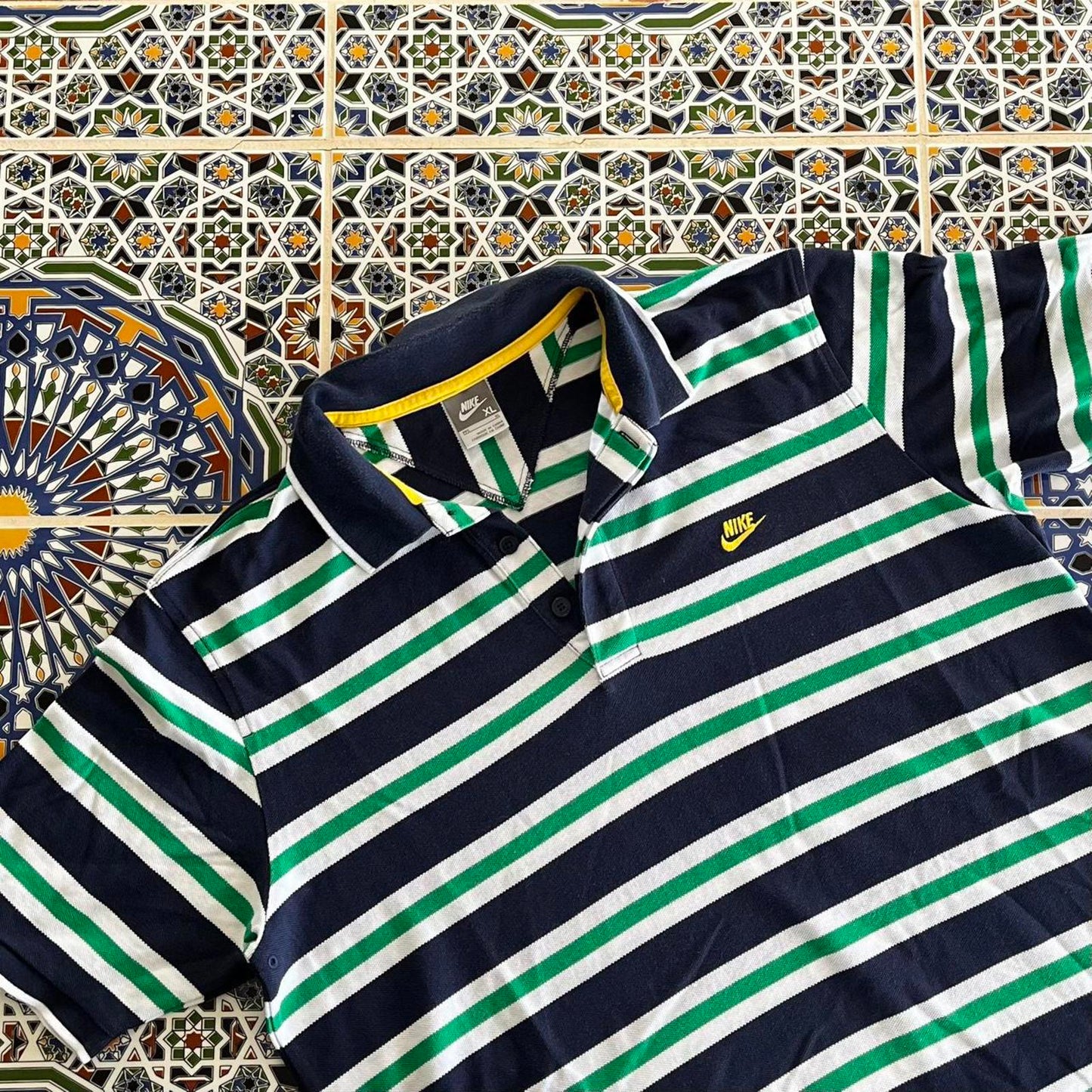 horizontal stripped Nike polo