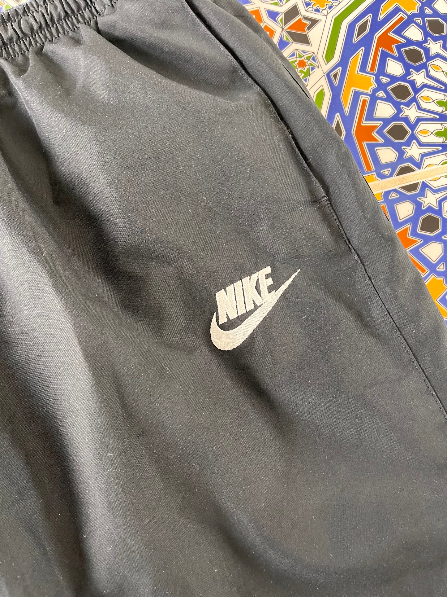 L Nike track pants