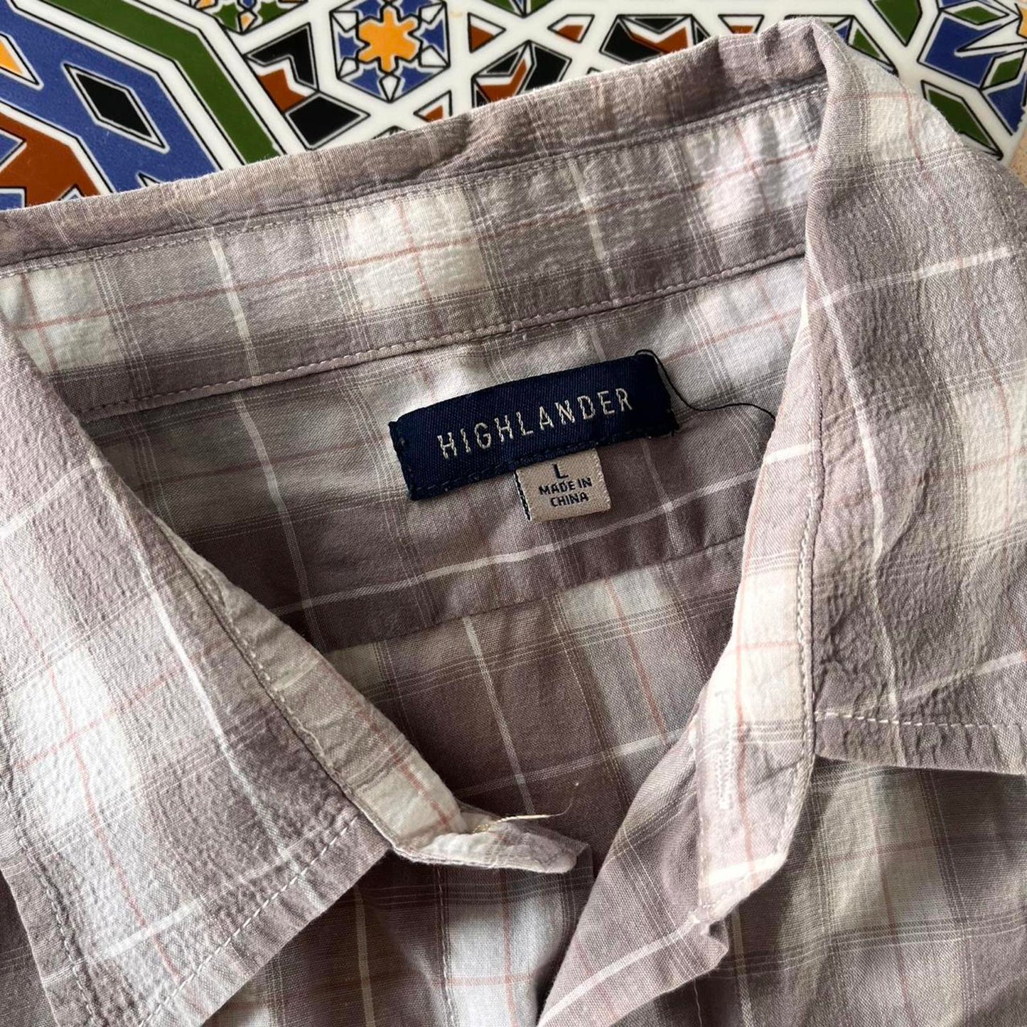 highlander short sleeved button up shirt