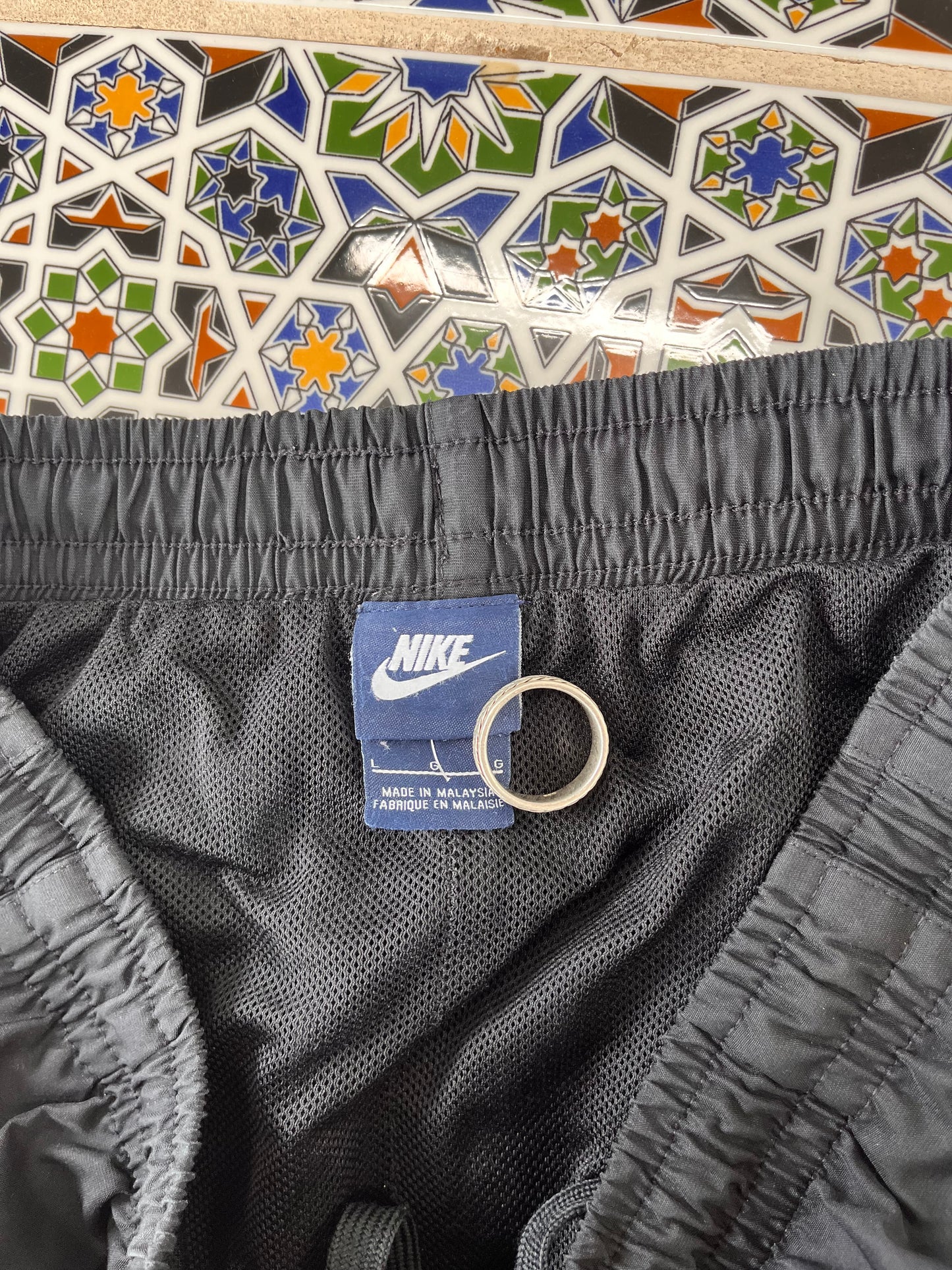 L Nike track pants