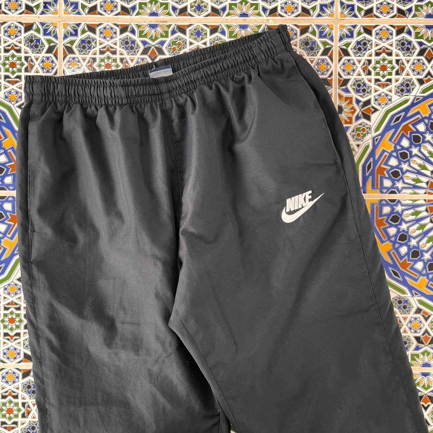 L Nike track pants